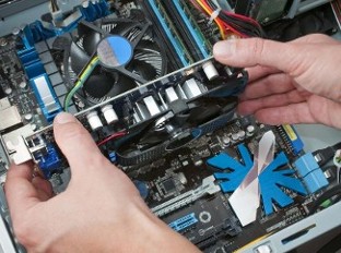 Man Repairing a Computer - Virus Removal